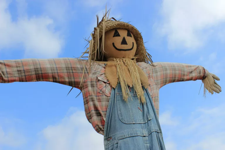 low-angle-view-scarecrow-against-cloudy-sky-562838541-5aaf18adfa6bcc00360a609c.png