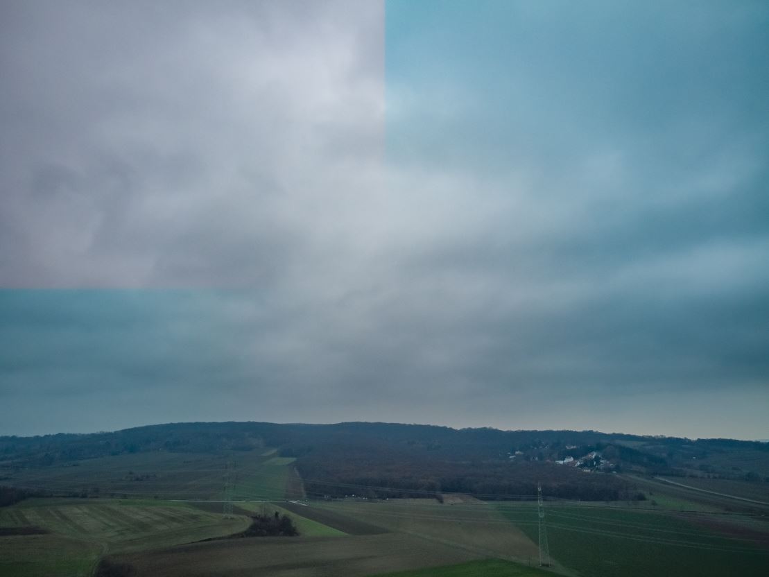 RAW aus dji mini2 mit Defekt oben links.JPG