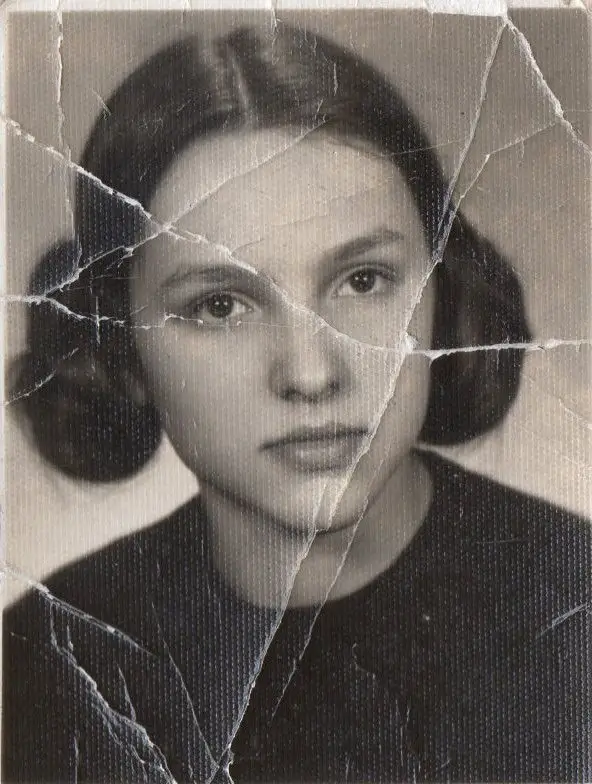 restored-vintage-girl-portrait-cleaned.webp